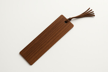 A beautiful wooden bookmark with a sleek design and a tassel. Ideal for book lovers who appreciate craftsmanship and the tactile experience of reading. Perfect for personalization.