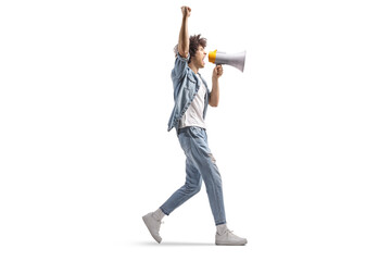 Young man walking with a megaphone and shouting