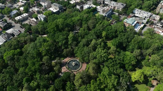 Panning Up Drone Footage of Forsyth Park in Savannah, Georgia, Overlooking the Entire City and the Historic District
