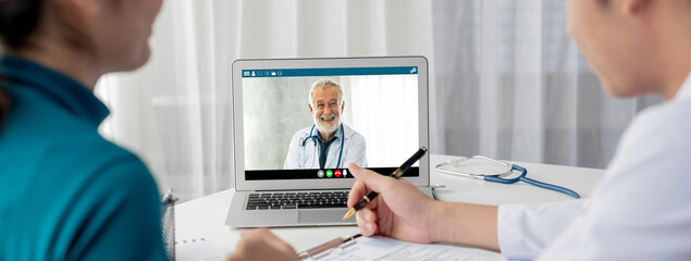 Doctor video call online by brisk telemedicine software application for virtual meeting with patient