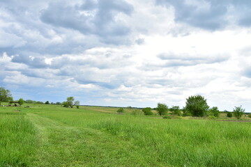 Clouds Over a Path in a Rural Farm Field