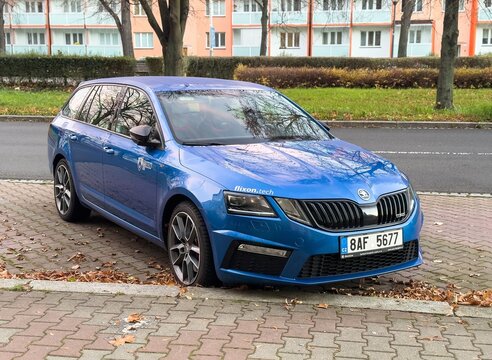 Blue Skoda Octavia RS Combi estate car parked on street