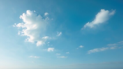 Fototapeta premium Decorative art design incorporating a beautiful blue sky and peculiar cloud shapes as natural background textures.