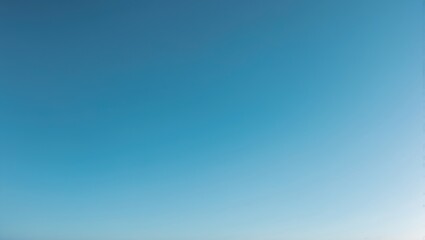 Bright, cloud-free blue sky serving as a clean background