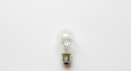 Bright Ideas: Illumination and Inspiration - A single light bulb on a white background symbolizes innovation, creativity, new ideas, energy efficiency, and progress
