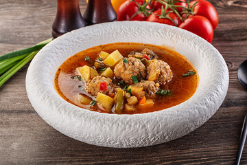 Tomato Soup with meatballs and vegetables