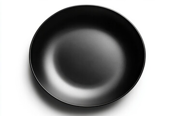 Black frying pan on white surface with sizzling vegetables and steam rising.