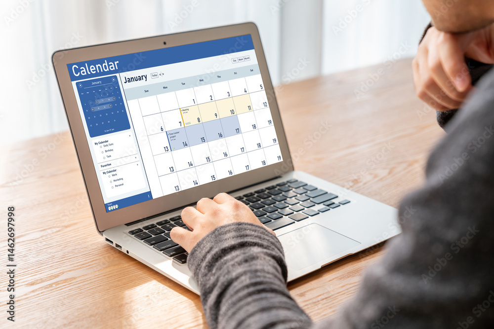 Wall mural calendar on computer software application for schedule planning for personal organizer and online bu