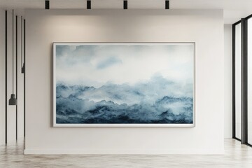 Abstract watercolor painting depicting a serene, misty mountain range in calming shades of blue.