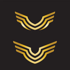 Gold Wings Vector Logo on Dark Surface © angga