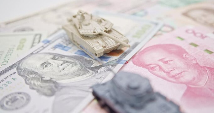 Geopolitical tensions, trade war, reciprocal tariffs, global economic and military competition : A visual juxtaposition of U.S. and Chinese currencies, tanks symbolizing conflict between US and China.