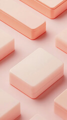 A collection of soft pink rectangular containers arranged on a pastel background, ideal for storage