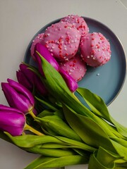 pink tulips on wooden background