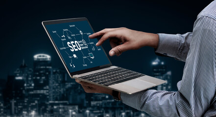 SEO search engine optimization for modish e-commerce and online retail business showing on computer...