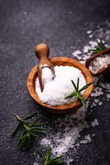 Natural sea salt crystals on dark background