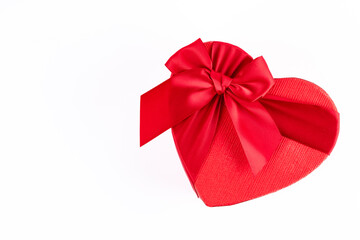 Red and heart shaped chocolate or candy box on white background
