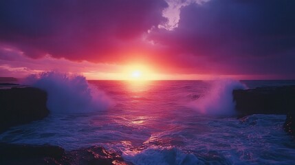 Obraz premium Dramatic ocean sunset waves crashing on rocks