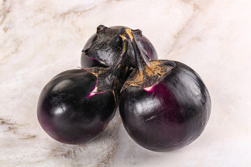 Raw violet and black eggplant