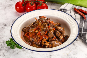 Baked chicken hearts with vegetables