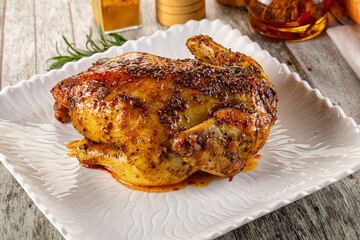 Baked in oven whole chicken with spices