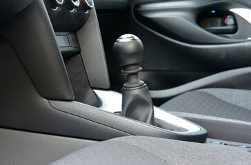 Manual shift lever in the passenger car. Manual gear shift.