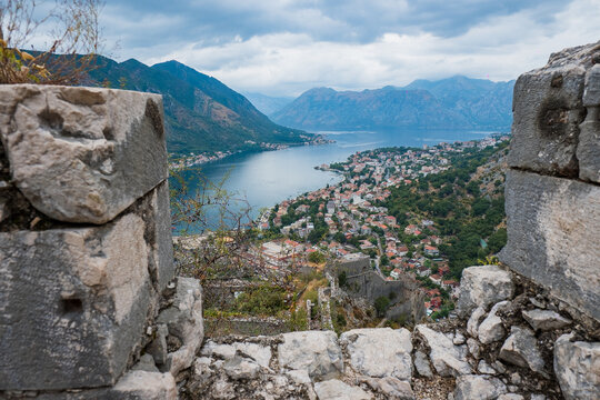 Top view over Kotor city, bay and port from the St. John's Castle on top of the mountain. Kotor is fortified town on Montenegro&rsquo;s Adriatic coast.