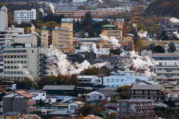 Beppu, Japan, city panorama skyline, Kannawa onsen distict, Oita prefecture, Kyushu island region,, Yukemuri observation deck, rising hot steam from onsen ryokan bath houses, Beppu resort hot springs