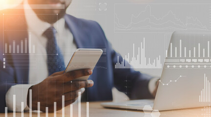 African American businessman using cellphone and laptop at workplace, collage with company analytics on imaginary screen. Online business management or marketing strategies concept