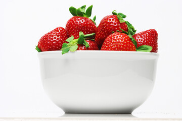 Fresh ripened Strawberries close-up on white