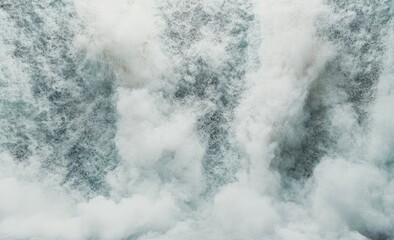 Foamy water cascading, powerful surge.  Dense white bubbles on turquoise water