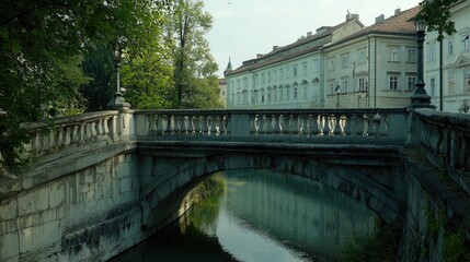 Aged stone bridge spanning a tranquil waterway.