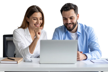 A photo of two happy business people in an office, sitting at a table and looking at a laptop screen together isolated on a transparent background