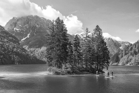Scenic landscape of Predil Lake in the Julian Alps, Tarvisio with mountains in background, Italy, Europe	