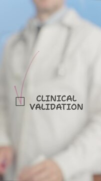 Medical professional wearing white lab coat and stethoscope marking checkbox for clinical validation. Working on transparent board with professional precision and focus against clean white background