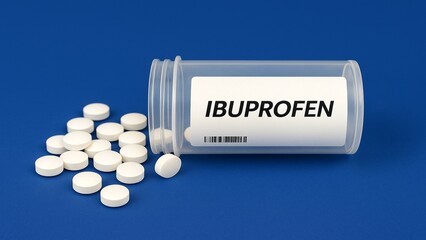 Box of ibuprofen tablets placed on a table, over-the-counter anti-inflammatory pain relief medication in daily use.

