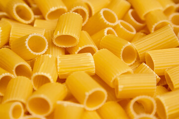 Close-Up of Uncooked Mezzi Rigatoni Pasta Tubes