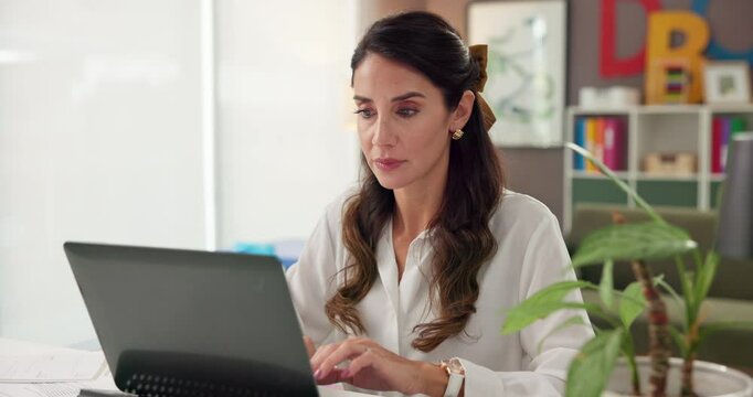 Laptop, teacher and woman typing in office for learning course, class schedule or check curriculum. Computer, educator and person online for writing, grading review or reading paper in kindergarten