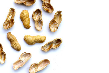 Peanut shells on white background.