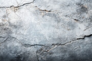 Fototapeta premium A weathered concrete wall with cracks and a gradient, providing a textured, vintage, and industrial background with a sense of age and decay for design projects.