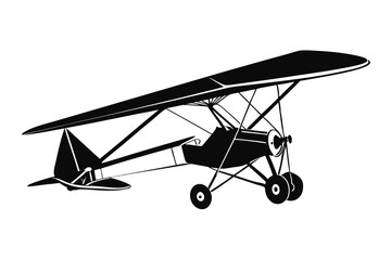 Vintage monoplane exhibits a black silhouette against a white background showcasing aerodynamic design