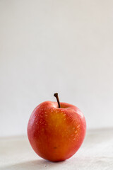 red apple on white background, water droplets, fruit, health 