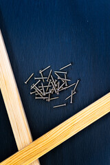 screws and tools on the black background, carpentry 