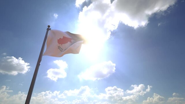 Cyprus Flag waving on a Flagpole from a Moving Angle in front of a blue sky with clouds	