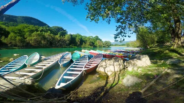 Colorful boats resting on the tampan river in tamul, san luis potosi