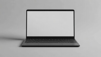 Modern black laptop with blank screen, angled slightly forward, on a light gray surface