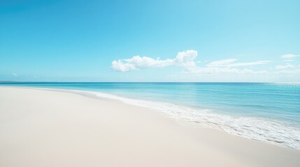 A beach with a clear blue ocean