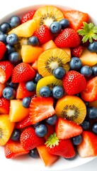 Obraz premium white bowl filled with lots of different types of fruit