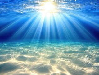 Obraz premium Sunlight beams through deep blue ocean water, illuminating sandy bottom. 