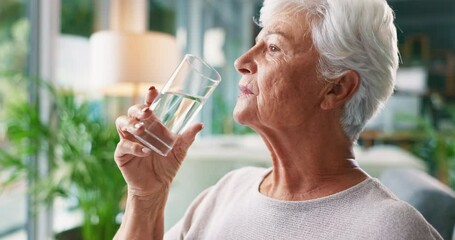 Drinking, water and senior woman with pills for wellness, health and hydration in living room. Retirement home, happy and elderly person with liquid for taking tablets, medicine and prescription
