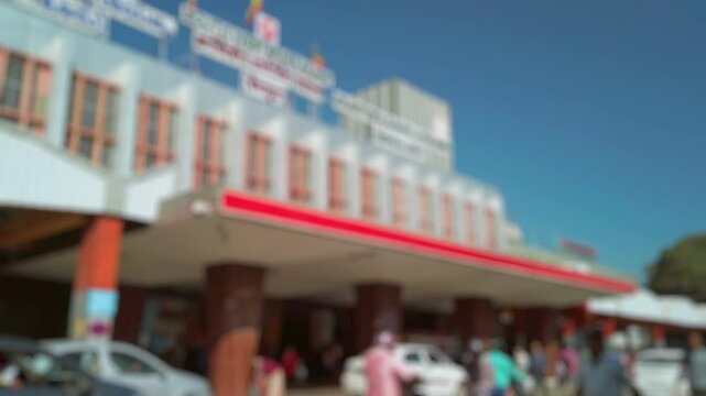Bokeh view of KSR Bengaluru (Krantivira Sangolli Rayanna) railway station, Bangalore, India. Blurred background footage.